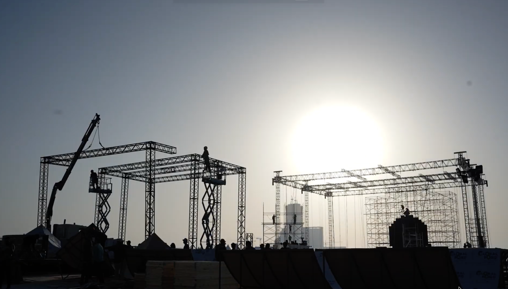 Rigging and production setup at sunset